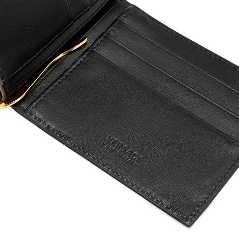 versace rock schwarz gold|Versace leather wallet.